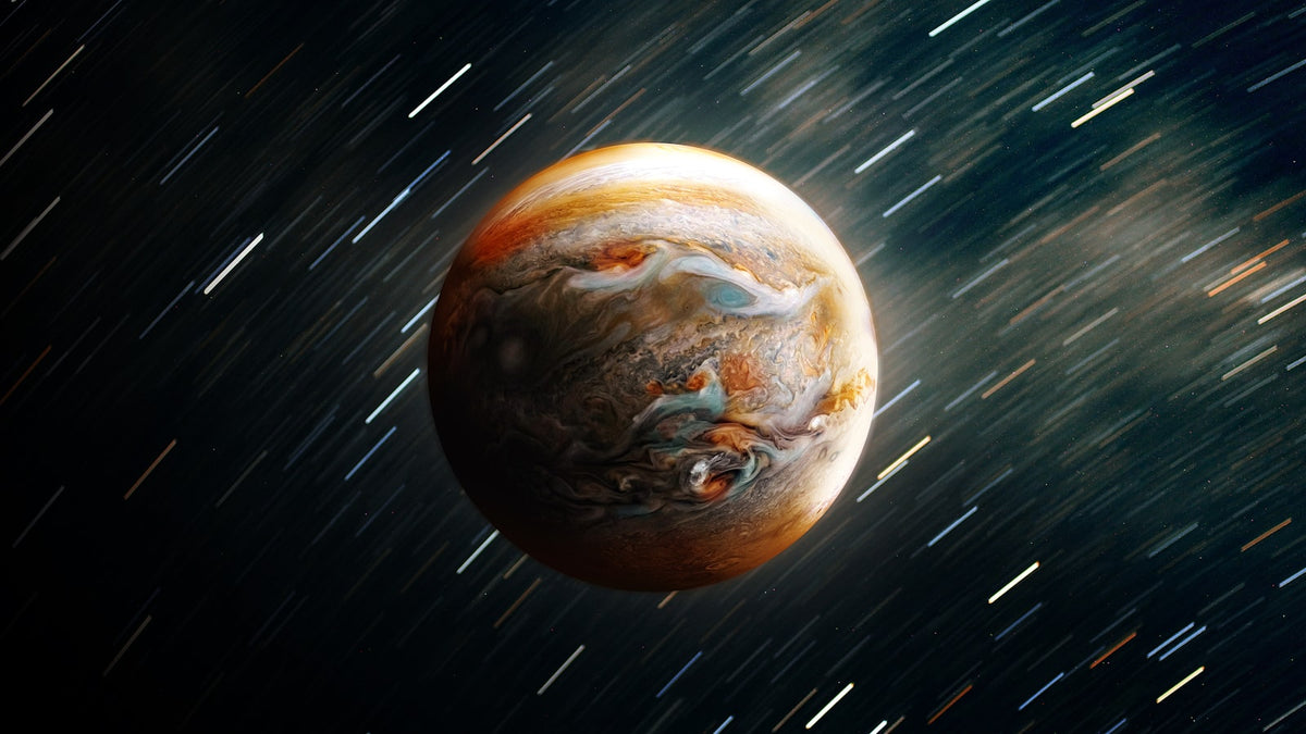 The planet Jupiter showing its banded cloud layers against dark space